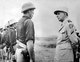 France / Vietnam: General Jean de Lattre de Tassigny (1889-1952) reviewing French forces at Hoa Binh, c. 1951